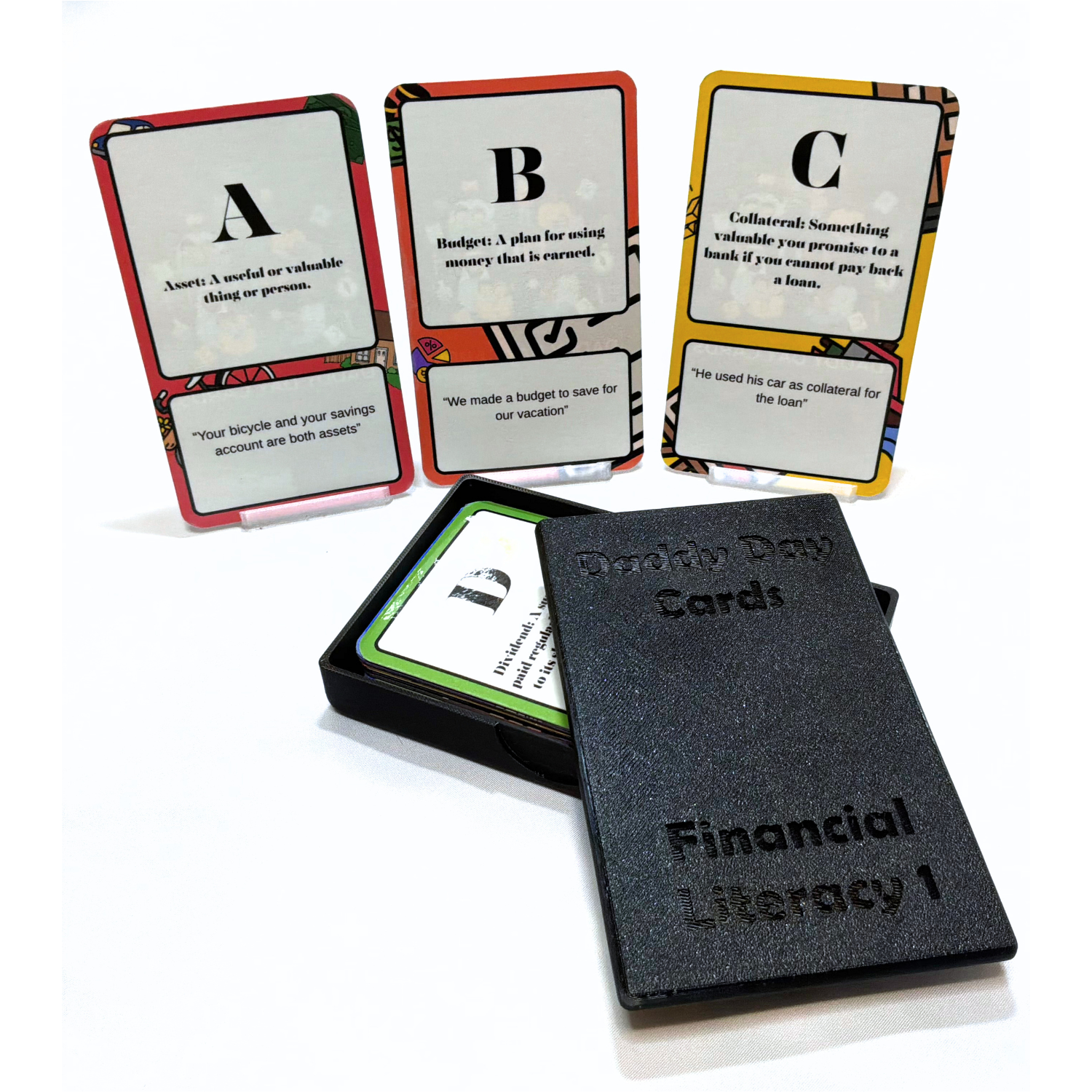 Educational card set titled 'Financial Literacy 1' with cards displayed and a black box labeled Daddy Day Cards.