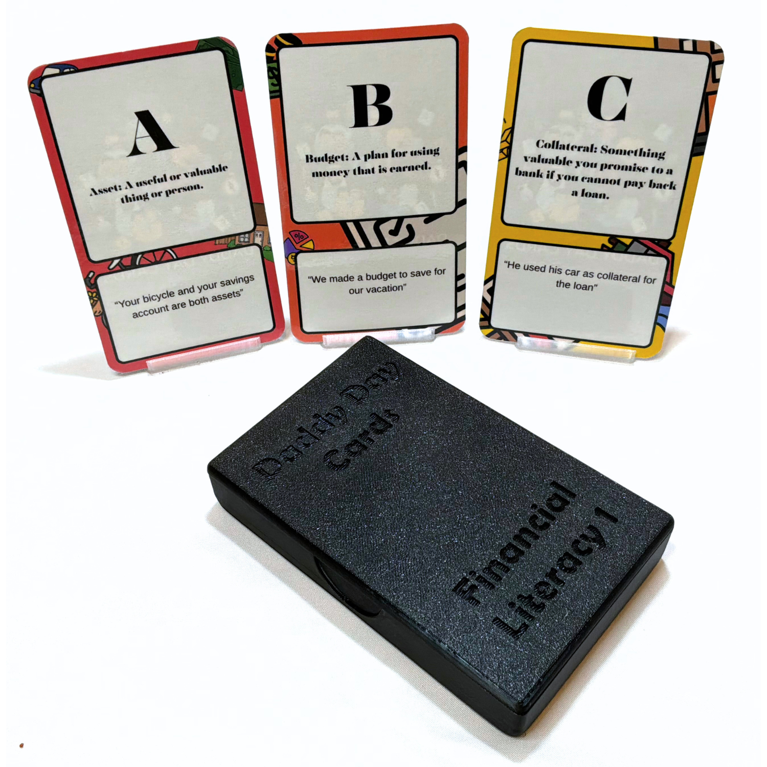 Set of educational flashcards with text and a black case on a white background